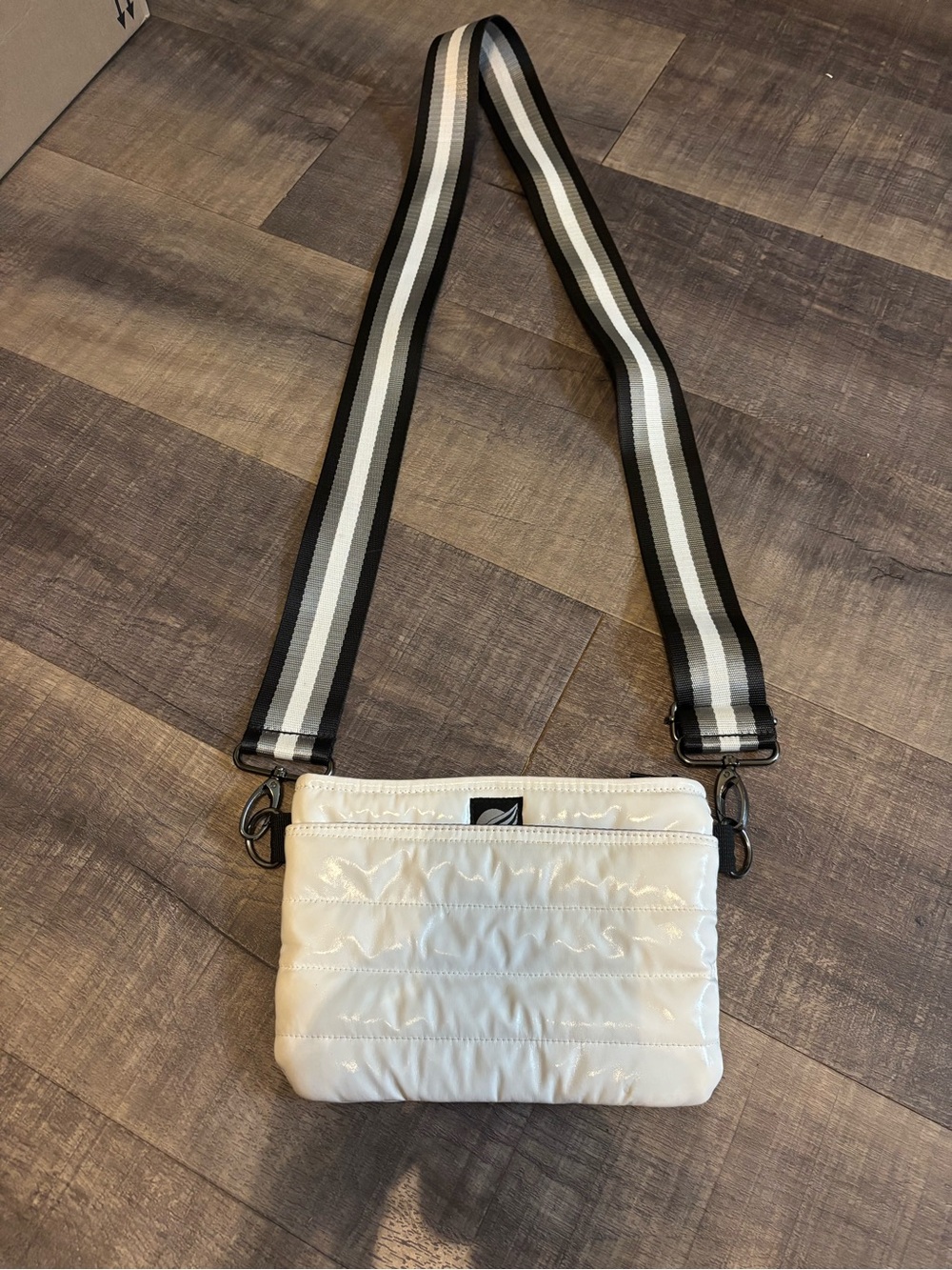 THINK ROYLN Quilted Cream Crossbody with Black-and-White Striped Strap
